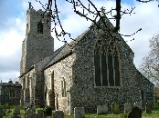 massive tower, smaller church