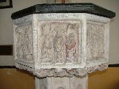 S: Mass, the celebrant with his back to the viewer, the acolyte on one side holding a taper while the other rings a bell which swings wildly