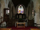 nave altar and crowded chancel beyond