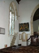 north side: rood loft stair, royal arms and niches