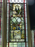 Stained glass collected in the north aisle