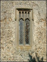 Late medieval window set in the tower, probably contemporary with the bell stage