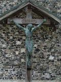 War memorial, now leaning up against the tower.