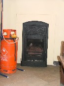 fireplace - and a modern, cruder form of heating