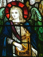 angel playing a dulcimer