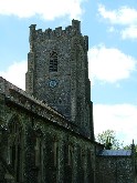 Perp juxtaposition of tower and porch