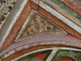 Detail in a spandrel of the screen