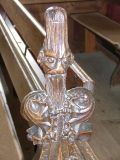 Bench end: Poppyhead face - scandal?