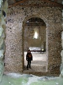 view through the east window into the chancel, 8 year old Martha in the chancel arch for scale