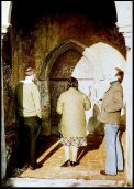 Roger Last showing the Harrods around Corpusty church, 1974
