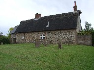 cottage on the edge of the graveyard