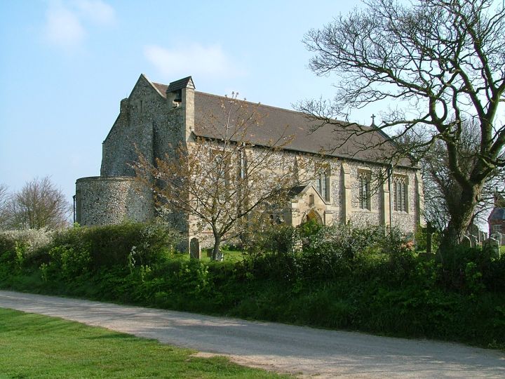 Dilham: a college dining hall with a large flower vase attached