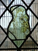 Madonna and child, so faded as to be transparent, to be barely there