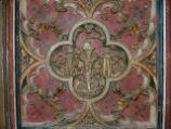 The roodscreen dado - a crucifix grows from the stem of Jesse