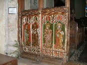 north side: St Cecilia with her floral wreath, St George killing a dragon, St Catherine with her sword and wheel, St Peter with his keys