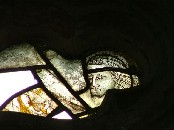 female Saint, head of Christ