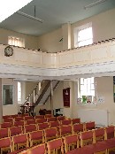 stairway in the corner to the balcony