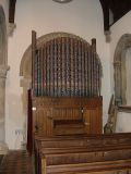 Pipe organ set in south aisle apse