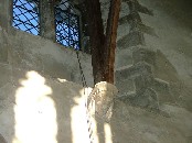corbel and beam over window in chancel