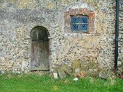 original Norman doorway, and a curious window