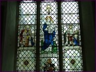 Beautiful modern window: Annunciation, Nativity, Presentation
