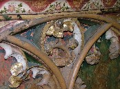 Lessingham screen:  tracery (detail) showing restoration by Green