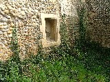 former aumbry inside the ruined chancel