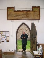 Peter enters by the west door