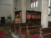 screened vestry in the north-west corner