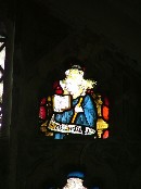 St Hilary in15th century glass at Magdalen