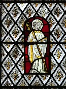 a tonsured figure with a crook