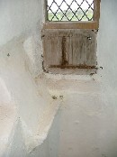 stone bookrest beside the window
