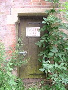 Keep Out signs on the padlocked doors