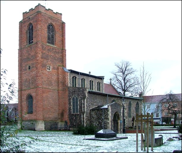St Augustine: red brick tower and a pretty little church