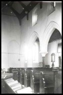 looking towards the north-west corner of the nave - note the iron pillars (c) George Plunkett