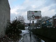 looking east. The tower stood about ten feet beyond the road sign. St James is in the distance.