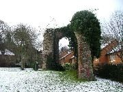 looking west through the Tudor tower arch and the west window