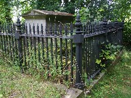 fenced mausoleum