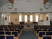 looking towards the sanctuary: the wall beyond is the old south wall of the original chapel