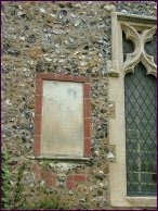 Memorial tablet set in the south wall