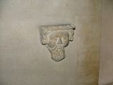 Sour-faced corbel
