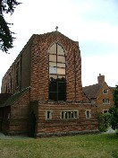 south end (liturgical west) - the low narthex extension contains the former baptistery