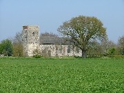 the church rising lonely on the plateau beyond