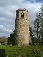 Norman tower with a 14th century bell stage
