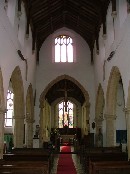 the view east with the window above the chancel arch