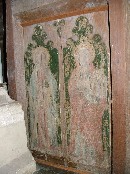 St Andrew with his saltire cross and St Peter with keys and a church
