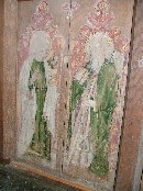 St John with his poisoned chalice and St James with his pilgrim staff and bag