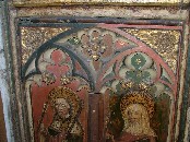 detail: spandrel carvings above St Edmund and St Clare