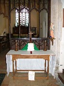 altar against screen in Anglo-catholic tradition