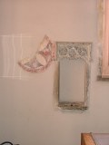 Consecration cross and piscina, south aisle